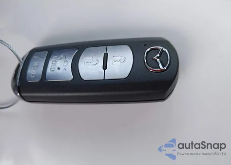 2015 Mazda Mazda3 I Touring z USA, uszkodzony, nr VIN JM1BM1V78F1223611